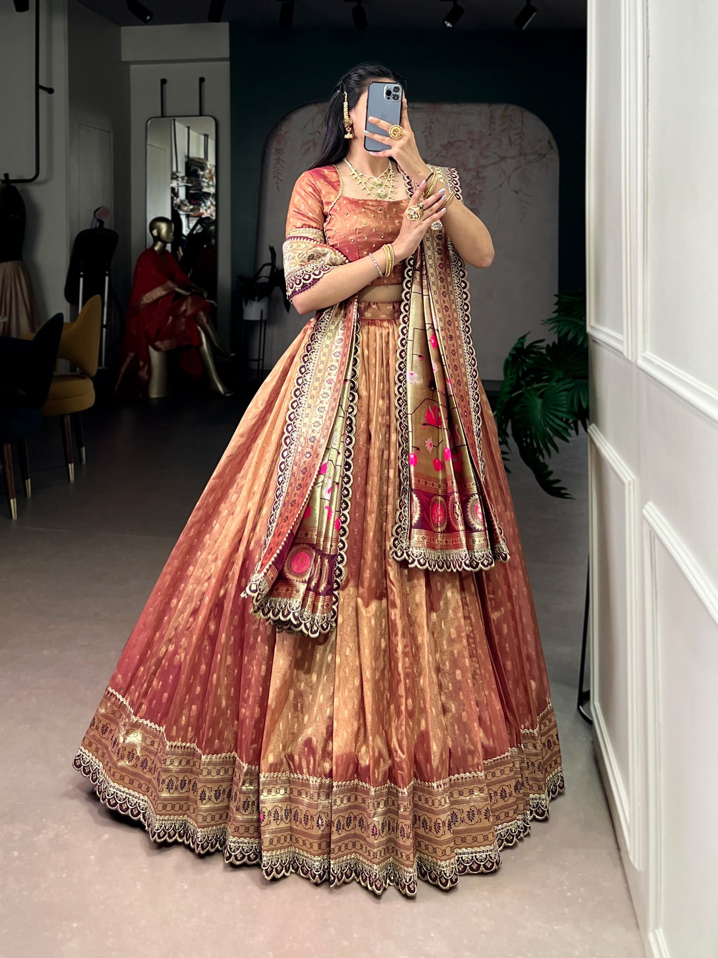 This shimmer organza lehenga choli adorned with zari weaving and delicate lace borders brings timeless elegance to every festive moment ✨