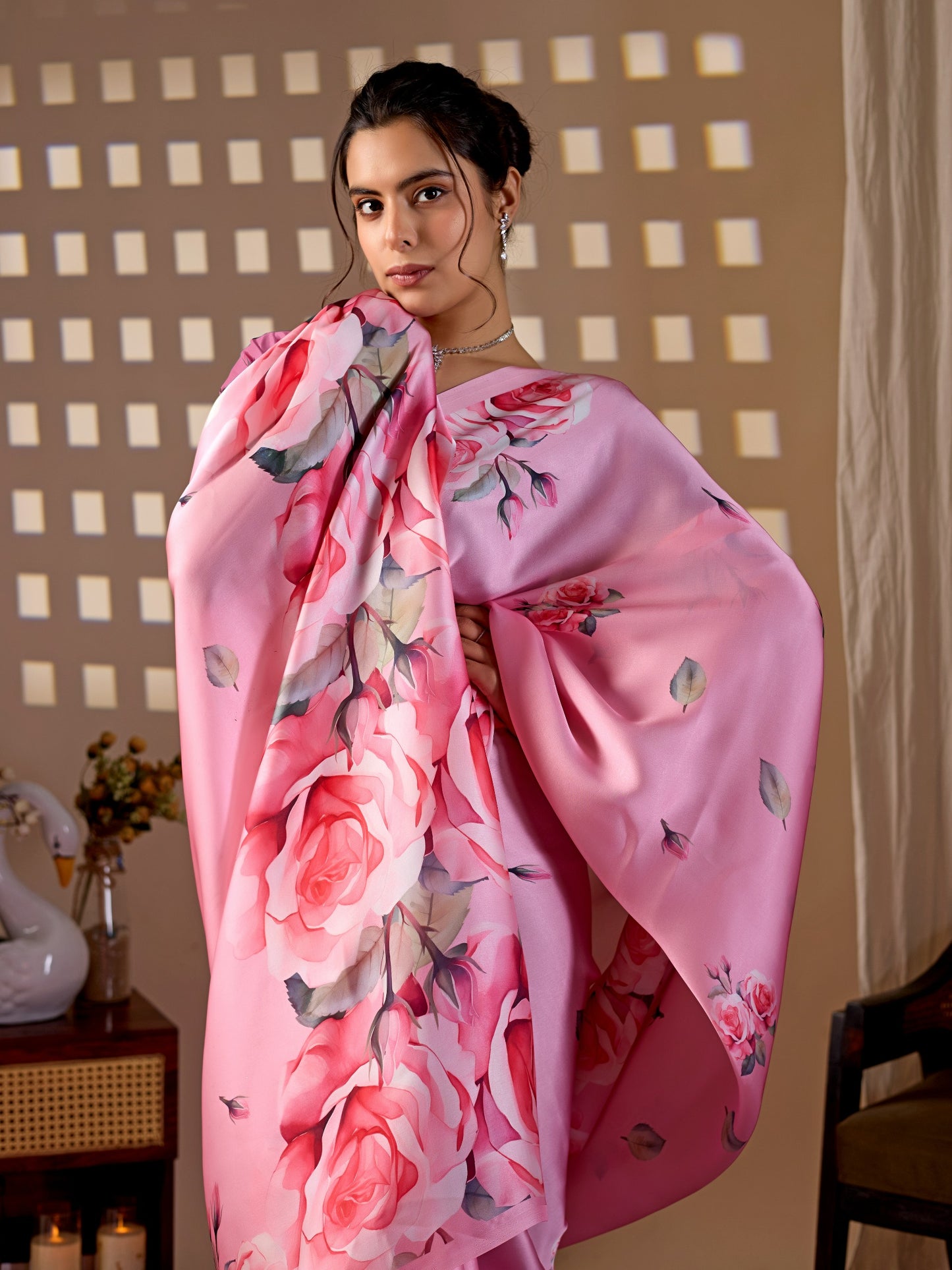 Elegant soft satin georgette saree featuring beautiful allover rose floral digital print in a soft baby pink tone, giving a graceful and charming look.