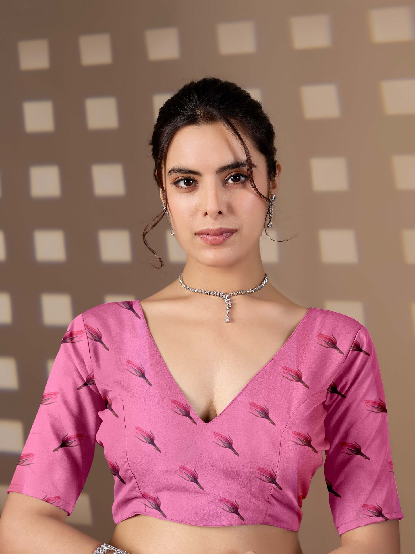 Elegant soft satin georgette saree featuring beautiful allover rose floral digital print in a soft baby pink tone, giving a graceful and charming look.