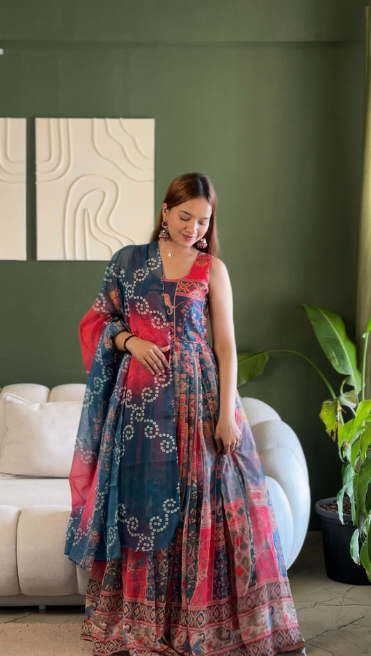 *🌿 Elegant Patola printed festive gown with graceful flair