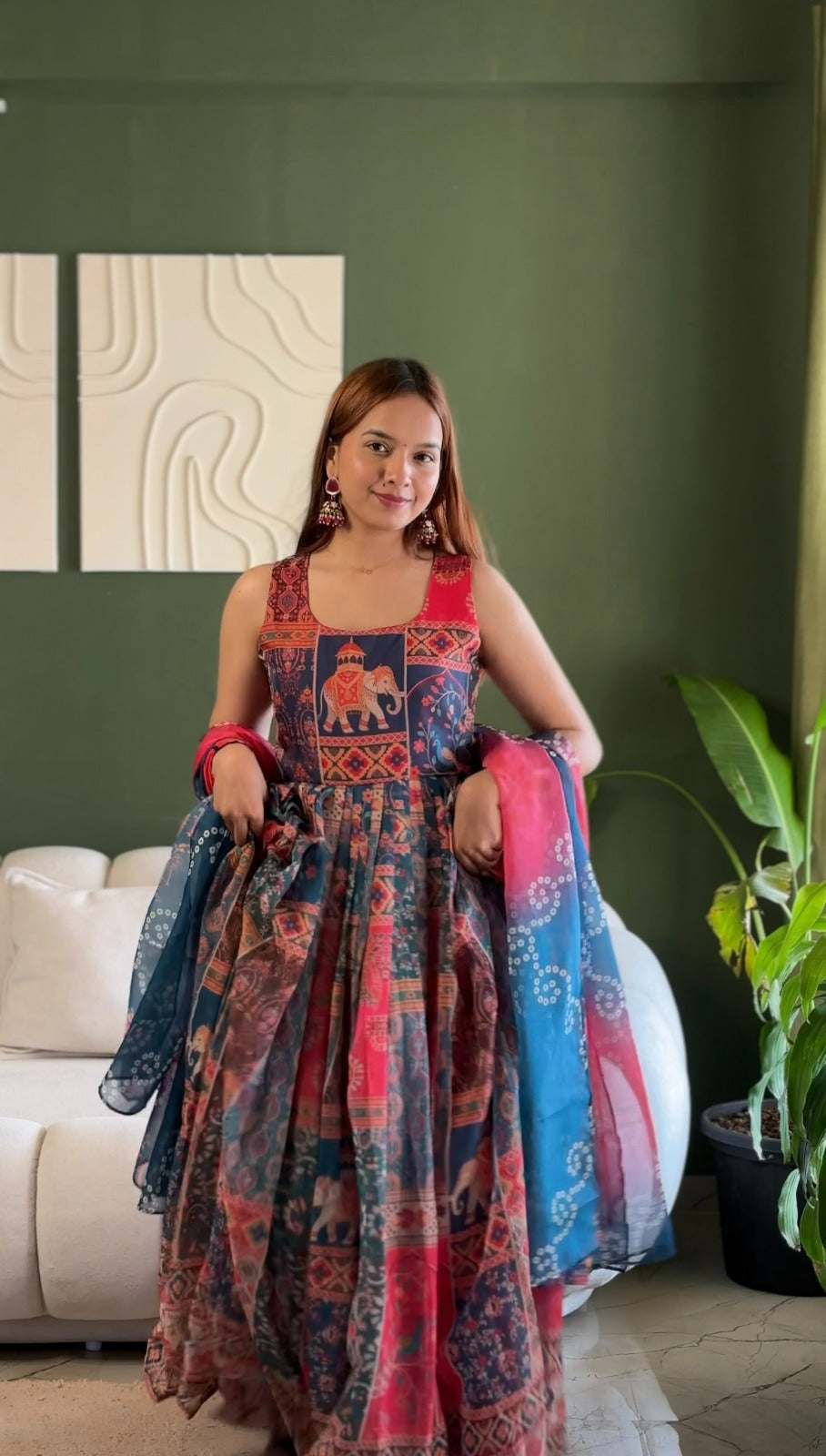 *🌿 Elegant Patola printed festive gown with graceful flair