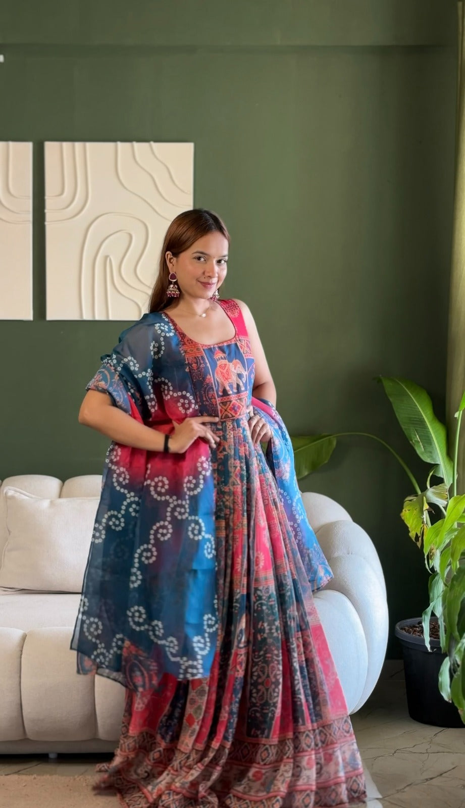 *🌿 Elegant Patola printed festive gown with graceful flair