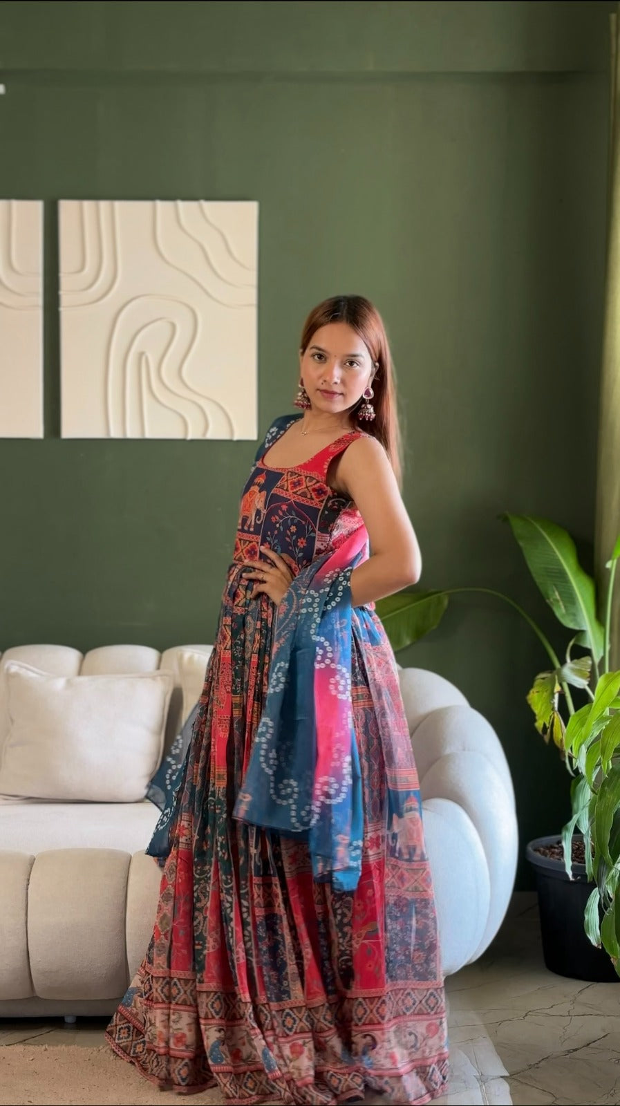 *🌿 Elegant Patola printed festive gown with graceful flair