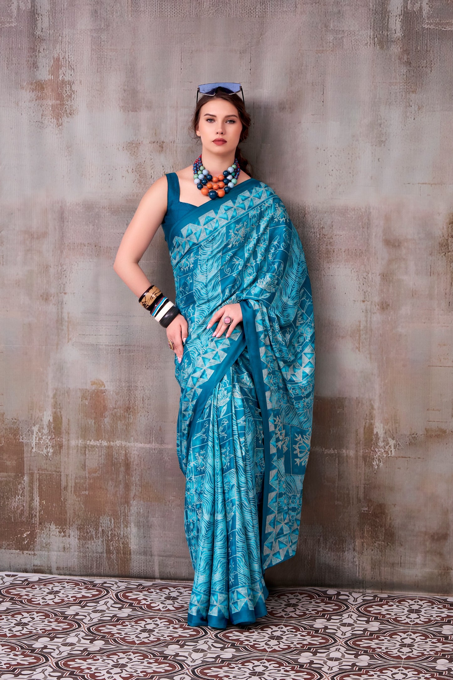 Elegance defined — draped in timeless grace with a floral & geometric printed saree that speaks style in every fold.🪷