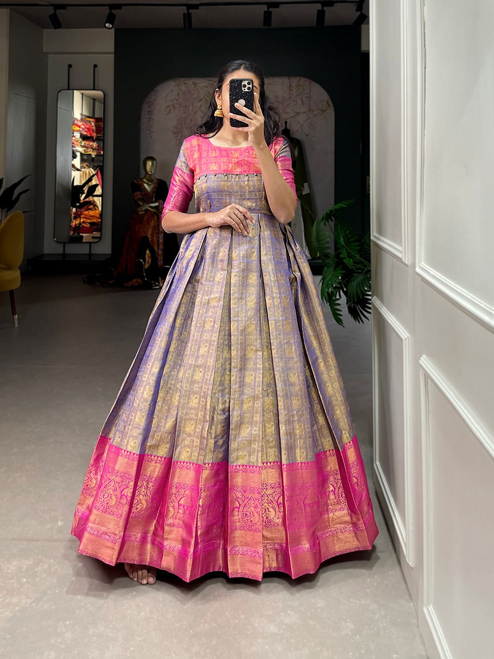 A joyful festive mood with Kanjivaram and zari weaving work appliqued gown 🌼