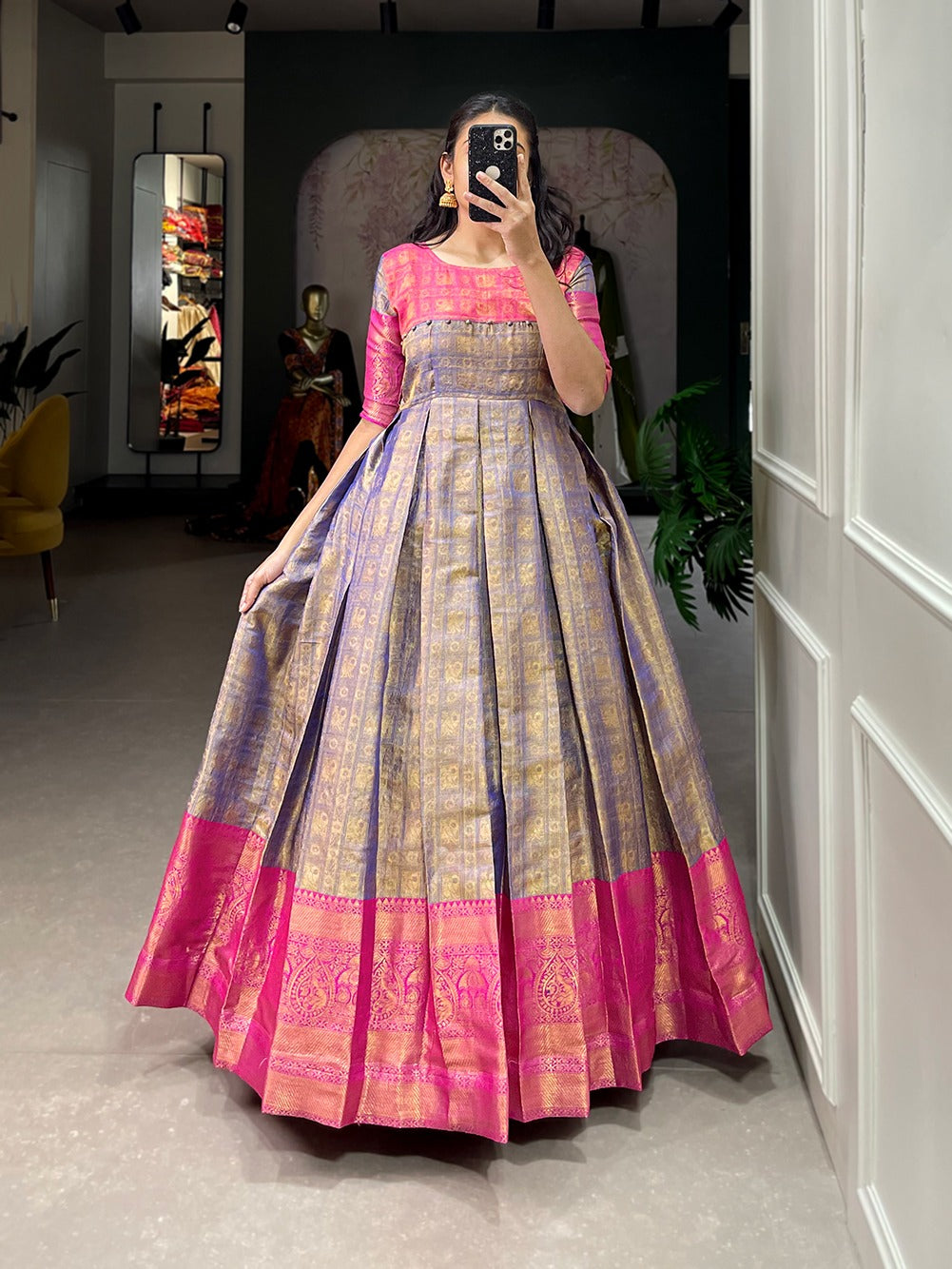 A joyful festive mood with Kanjivaram and zari weaving work appliqued gown 🌼