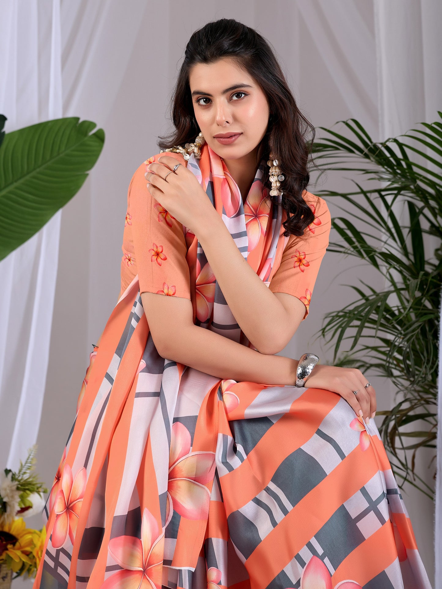 Elegant soft satin georgette saree featuring beautiful floral and striped digital print saree