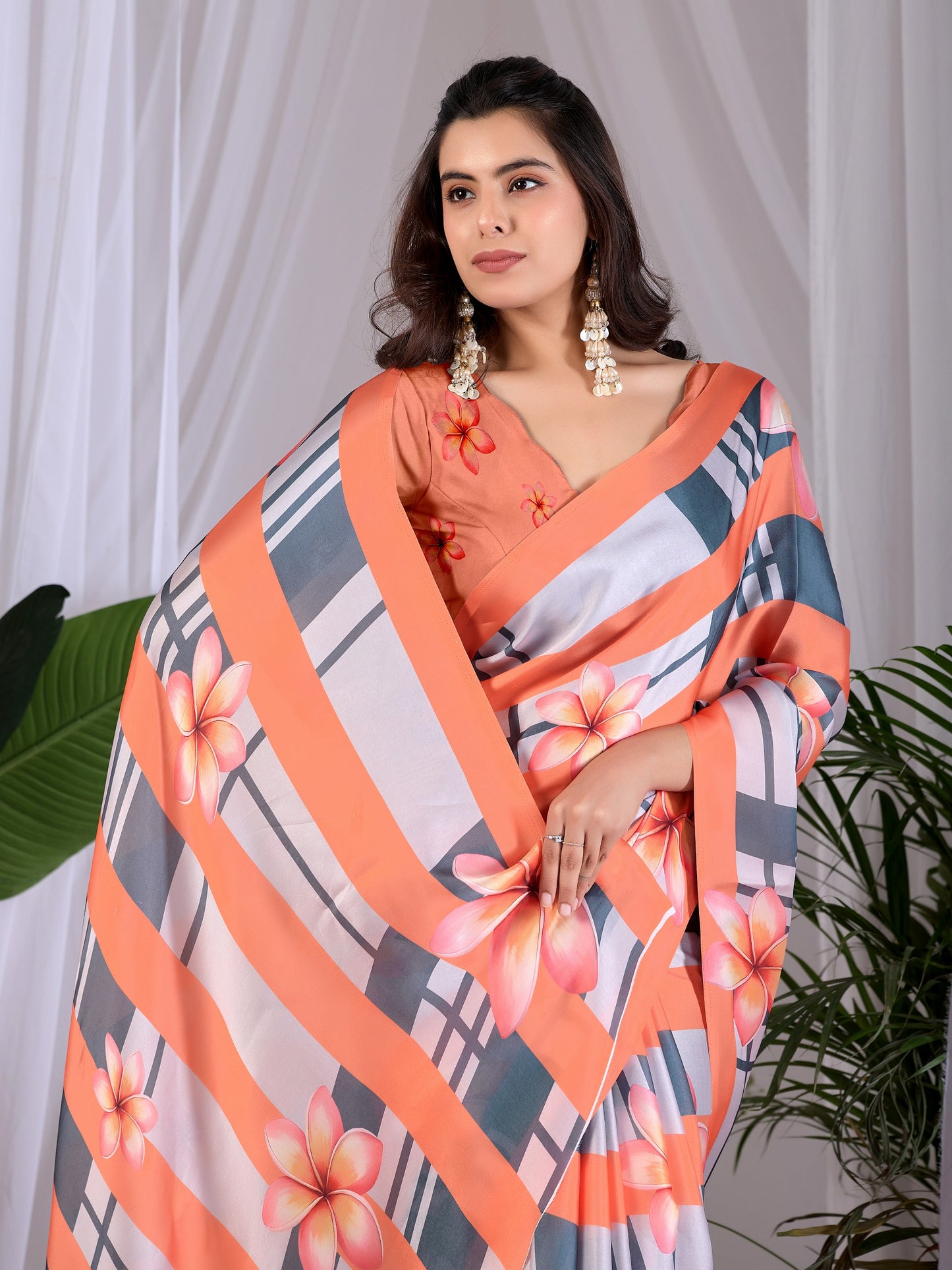 Elegant soft satin georgette saree featuring beautiful floral and striped digital print saree