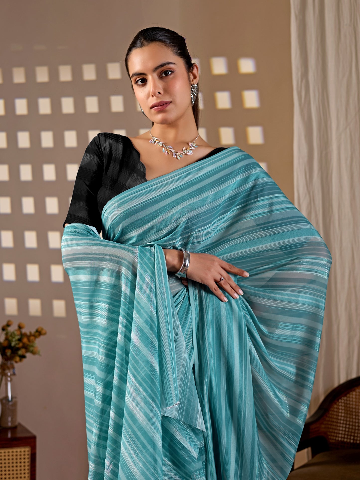 Premium Monsoon Saree featuring a refreshing aqua blue shade saree