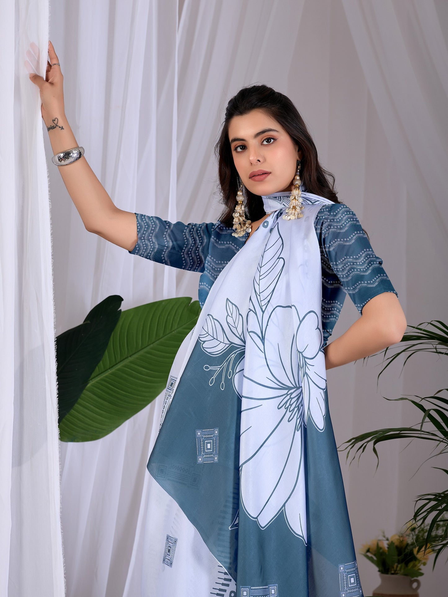 Elegant soft satin georgette saree featuring beautiful geometric and floral digital print saree
