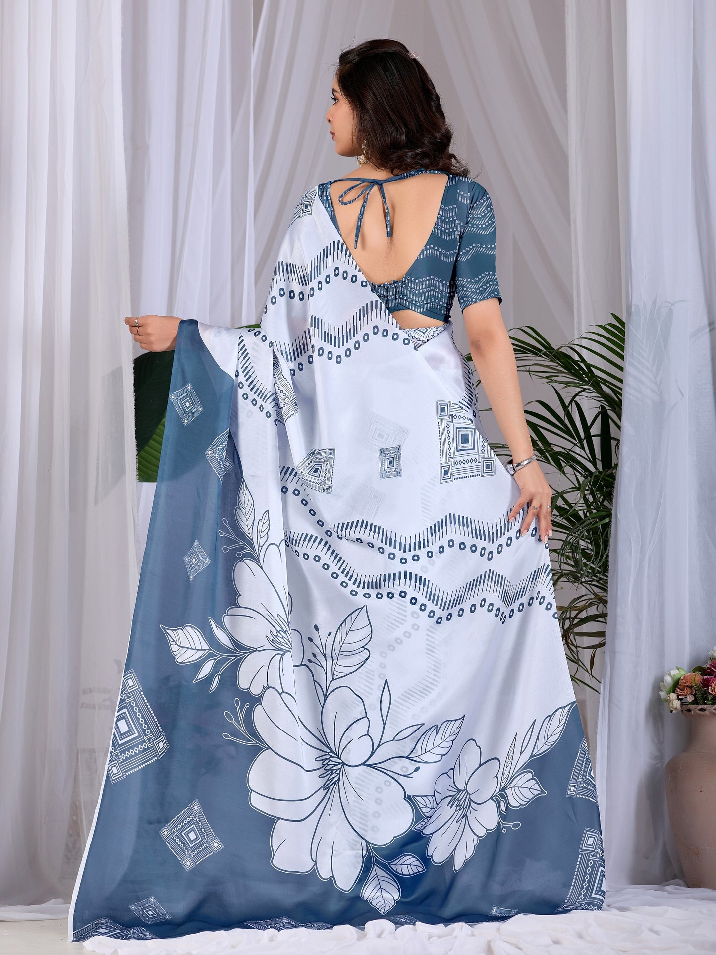 Elegant soft satin georgette saree featuring beautiful geometric and floral digital print saree