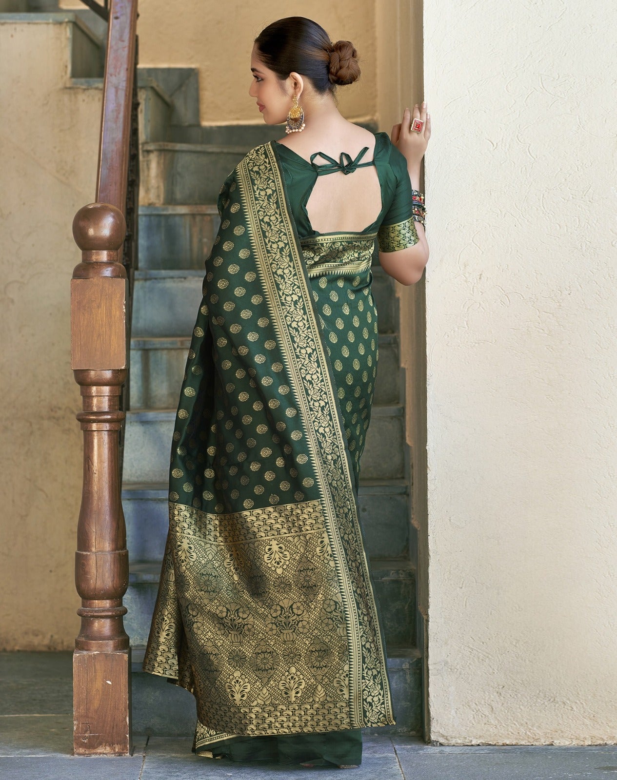 Silk Saree from the this store is adorned with beautiful Zari work in form of traditional motifs.