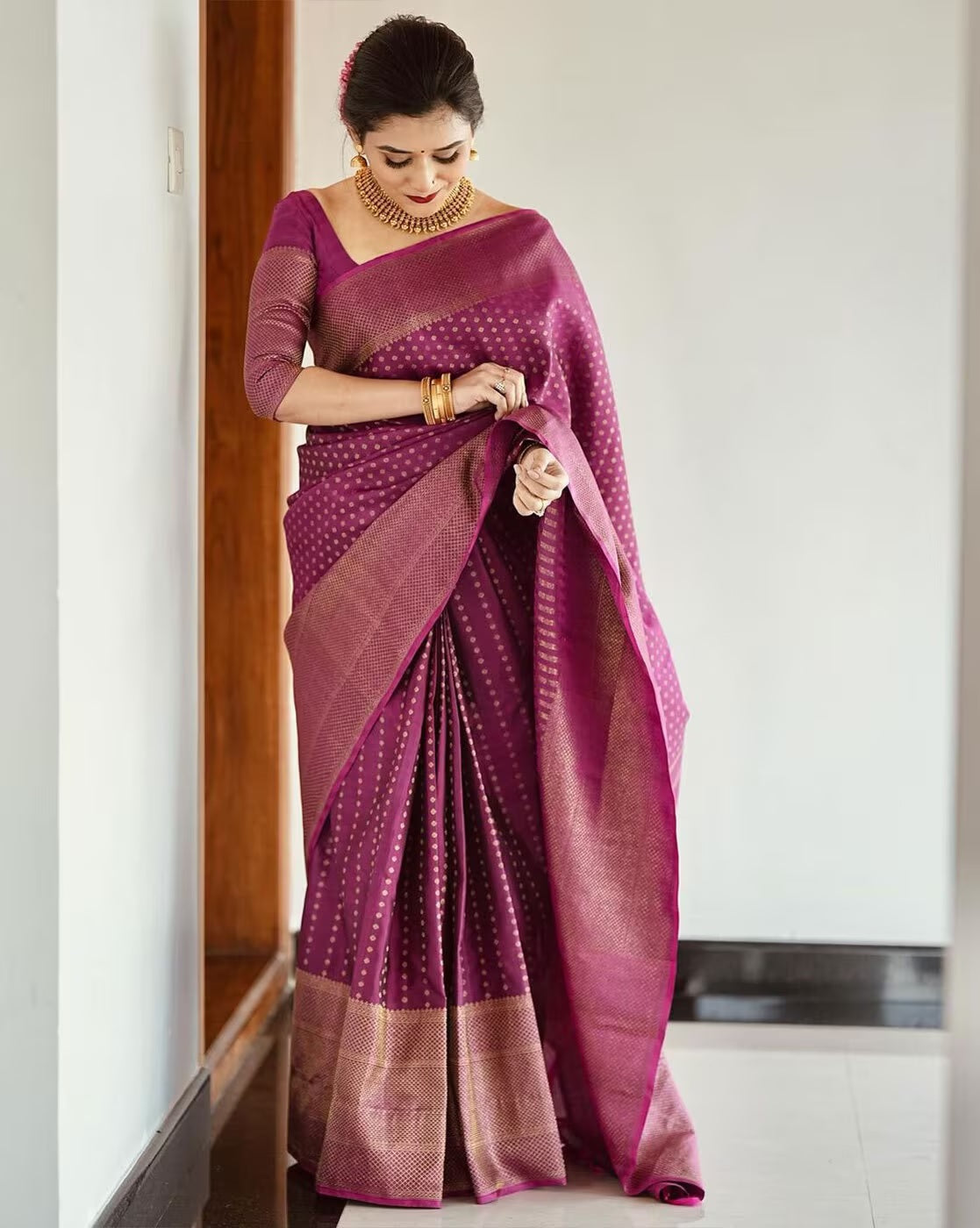 Silk Saree from the this store is adorned with beautiful Zari work in form of traditional motifs