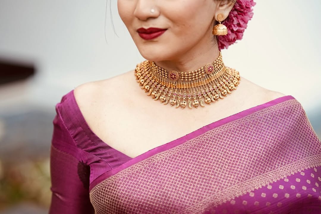 Silk Saree from the this store is adorned with beautiful Zari work in form of traditional motifs