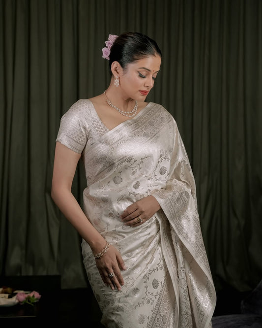 Silk Saree from the this store is adorned with beautiful Zari work in form of traditional motifs