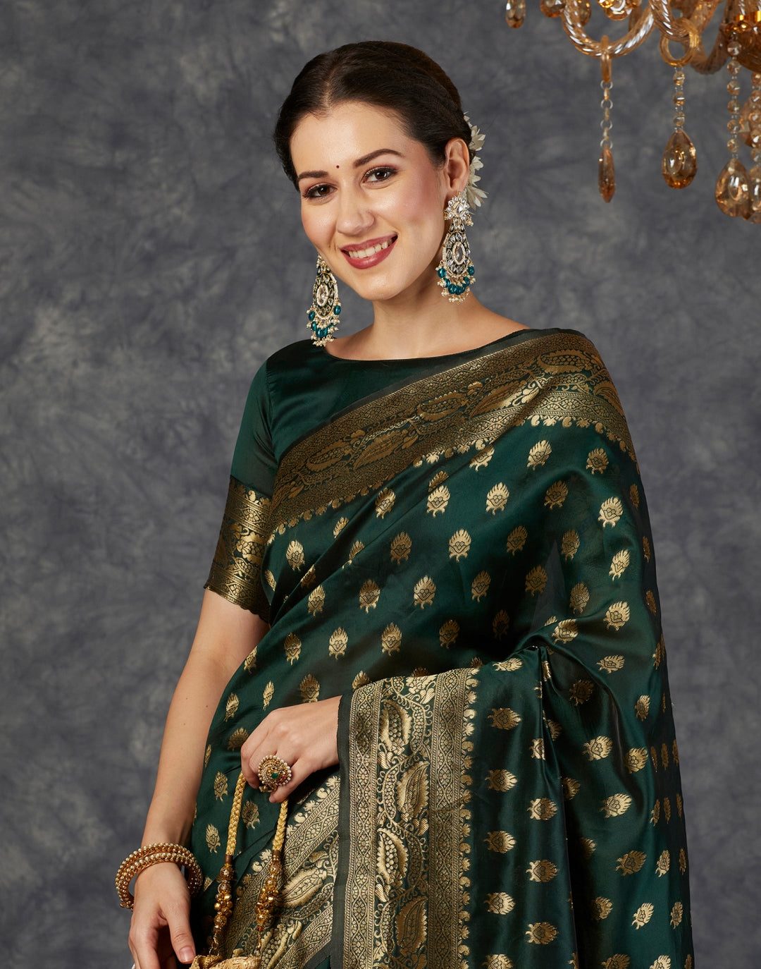Silk Saree from the this store is adorned with beautiful Zari work in form of traditional motifs.