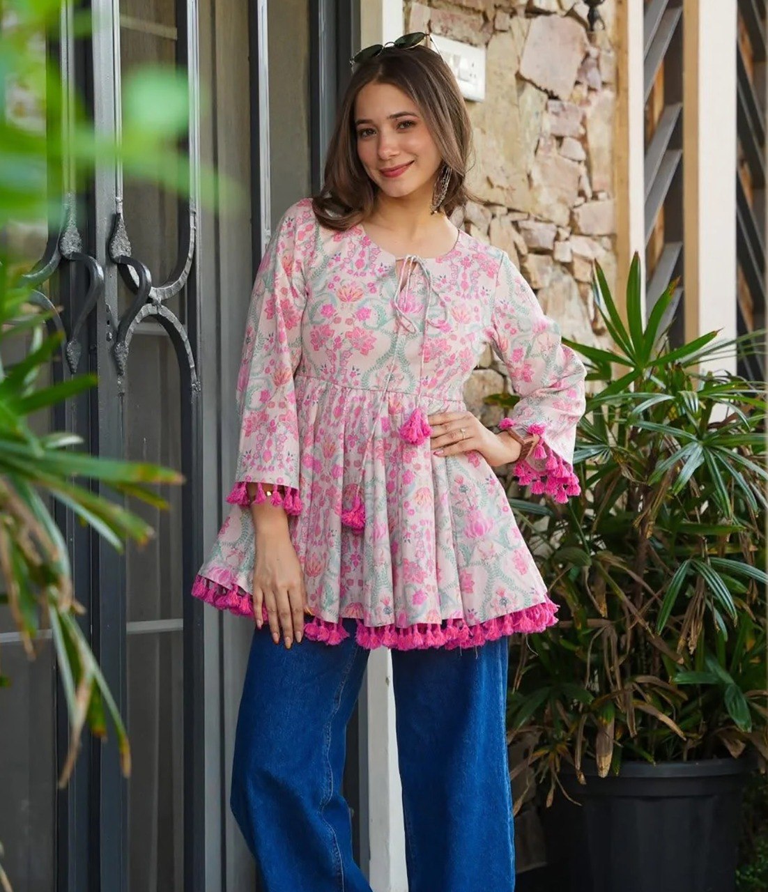 Boho-Chic Elegance: Pastel Pink Floral Printed Peplum Top with Playful Fringed Tassels for a Perfect Indo-Western Vibe 💕