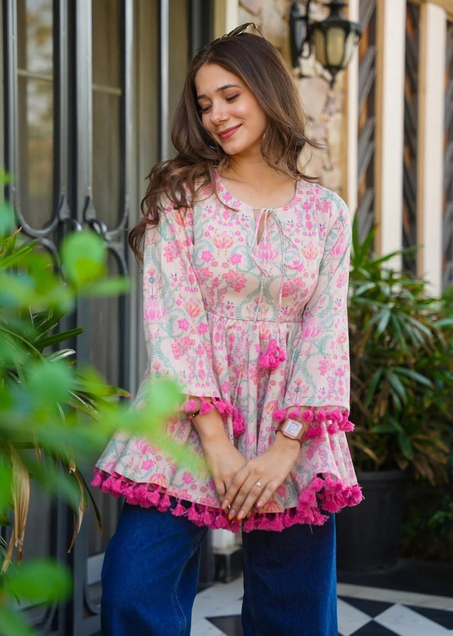 Boho-Chic Elegance: Pastel Pink Floral Printed Peplum Top with Playful Fringed Tassels for a Perfect Indo-Western Vibe 💕