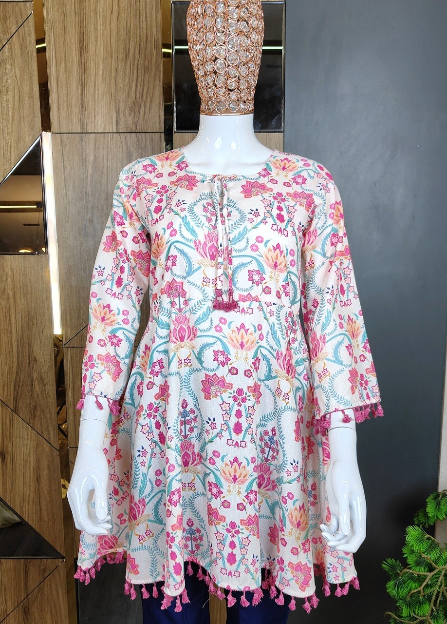 Boho-Chic Elegance: Pastel Pink Floral Printed Peplum Top with Playful Fringed Tassels for a Perfect Indo-Western Vibe 💕