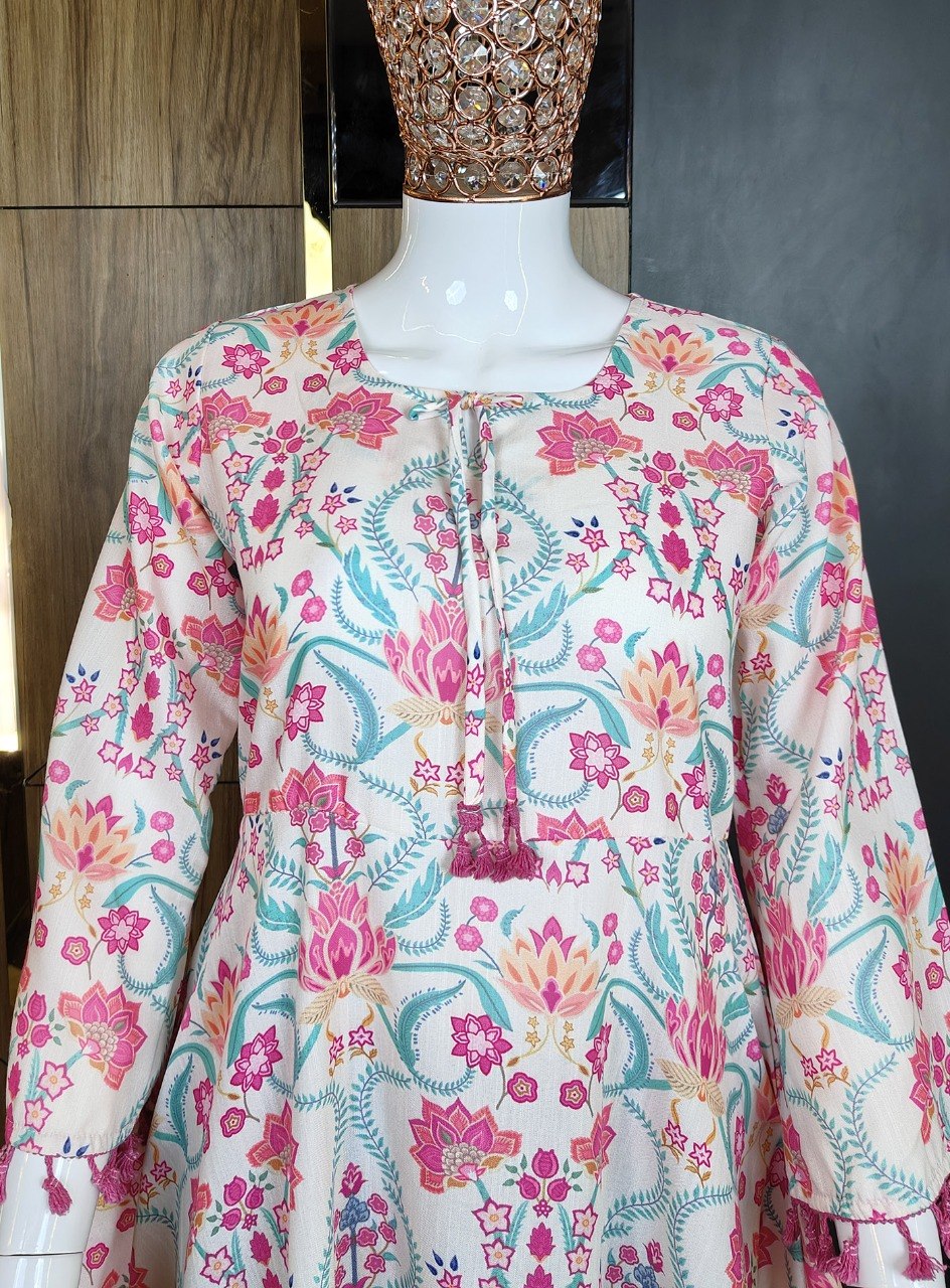 Boho-Chic Elegance: Pastel Pink Floral Printed Peplum Top with Playful Fringed Tassels for a Perfect Indo-Western Vibe 💕