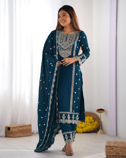 Classic Heritage Draped in Modern Style: Midnight Teal Straight Salwar Suit with Luminescent Silver Accents and Detailed Scallop Borders