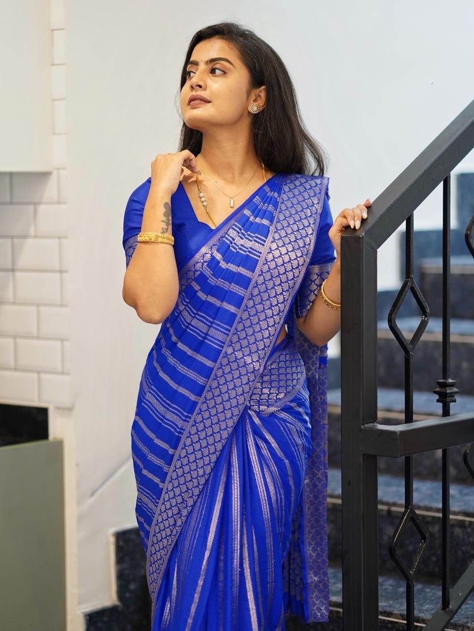 Silk Saree from the this store is adorned with beautiful Zari work in form of traditional motifs.