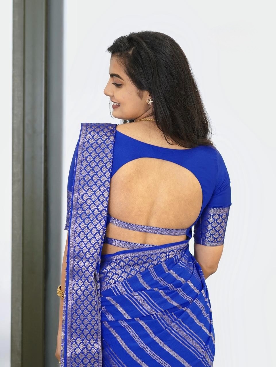 Silk Saree from the this store is adorned with beautiful Zari work in form of traditional motifs.