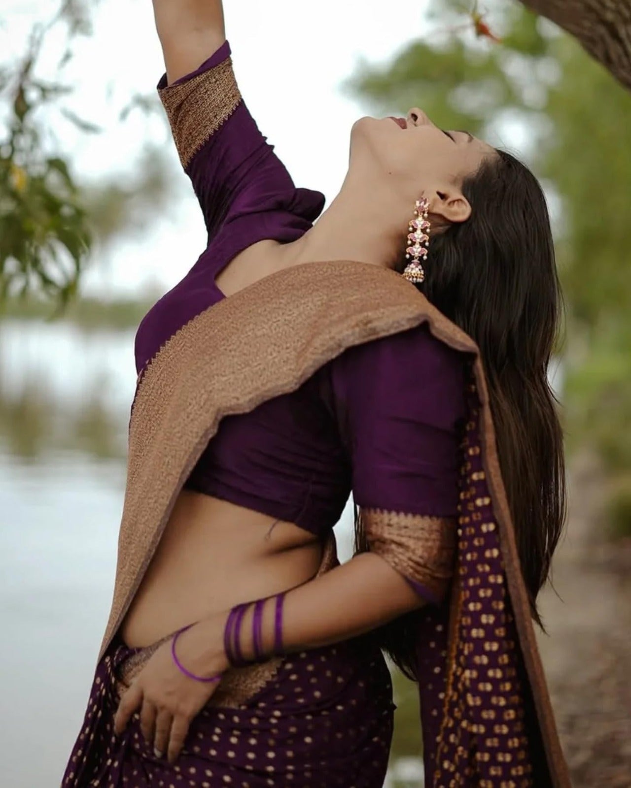 Silk Saree from the this store is adorned with beautiful Zari work in form of traditional motifs.