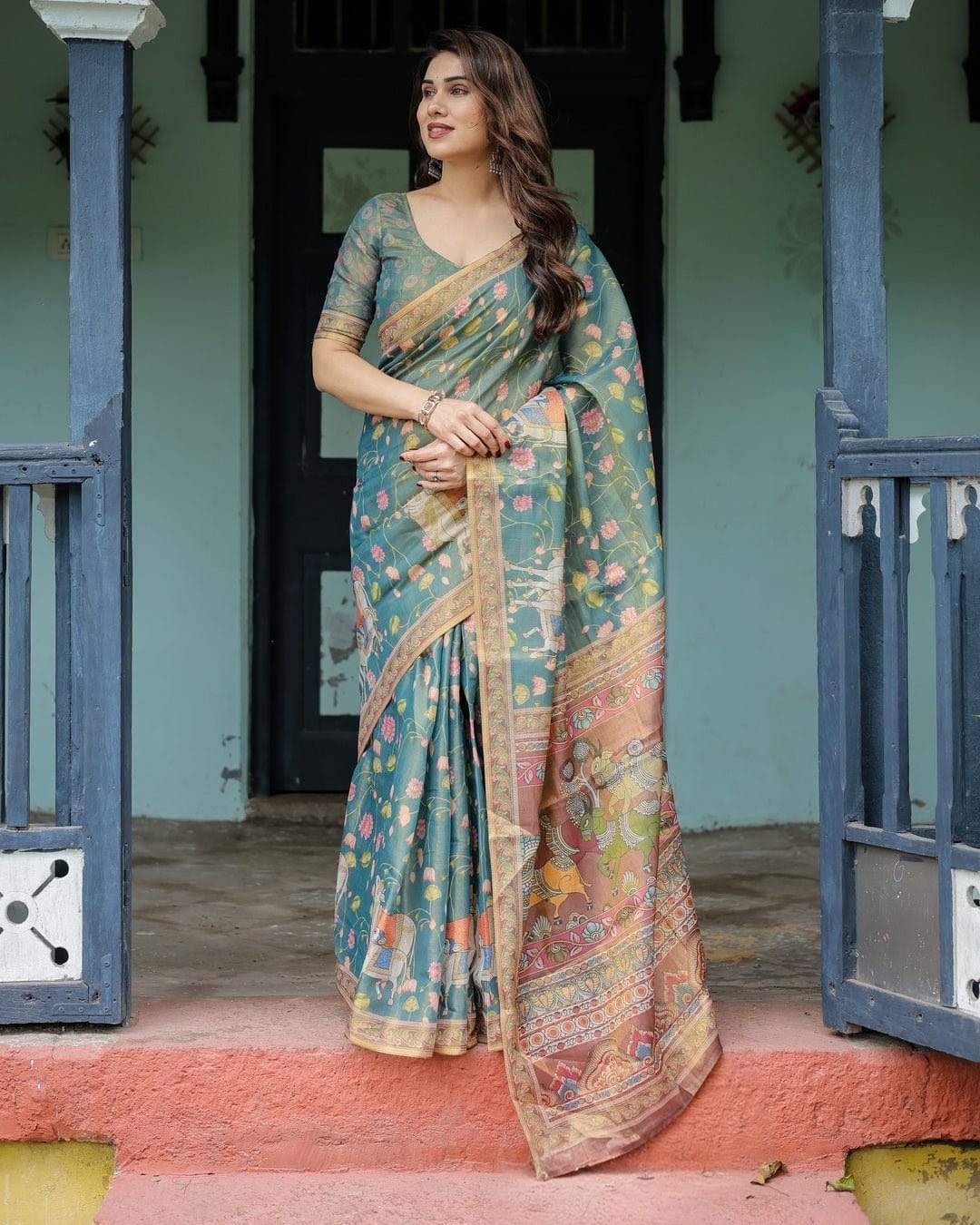 Elegant Teal Blue Floral Kalamkari Silk-Blend Saree with Heritage Borders