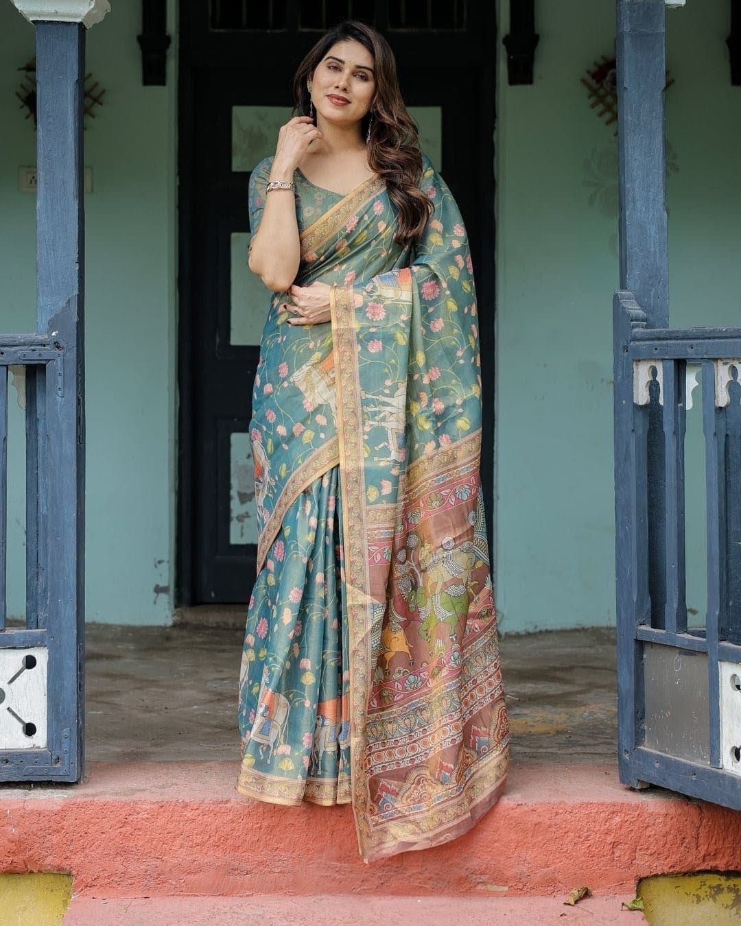 Elegant Teal Blue Floral Kalamkari Silk-Blend Saree with Heritage Borders