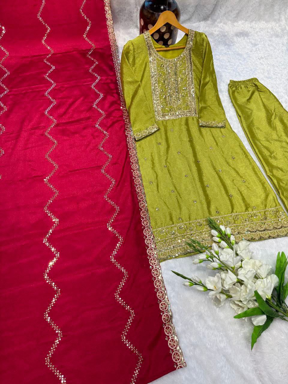 NEW  colour 3-pair Suit Set you've described seems to be a party wear outfit made from have pure chinon  fabric with  sequence  embroidery work .