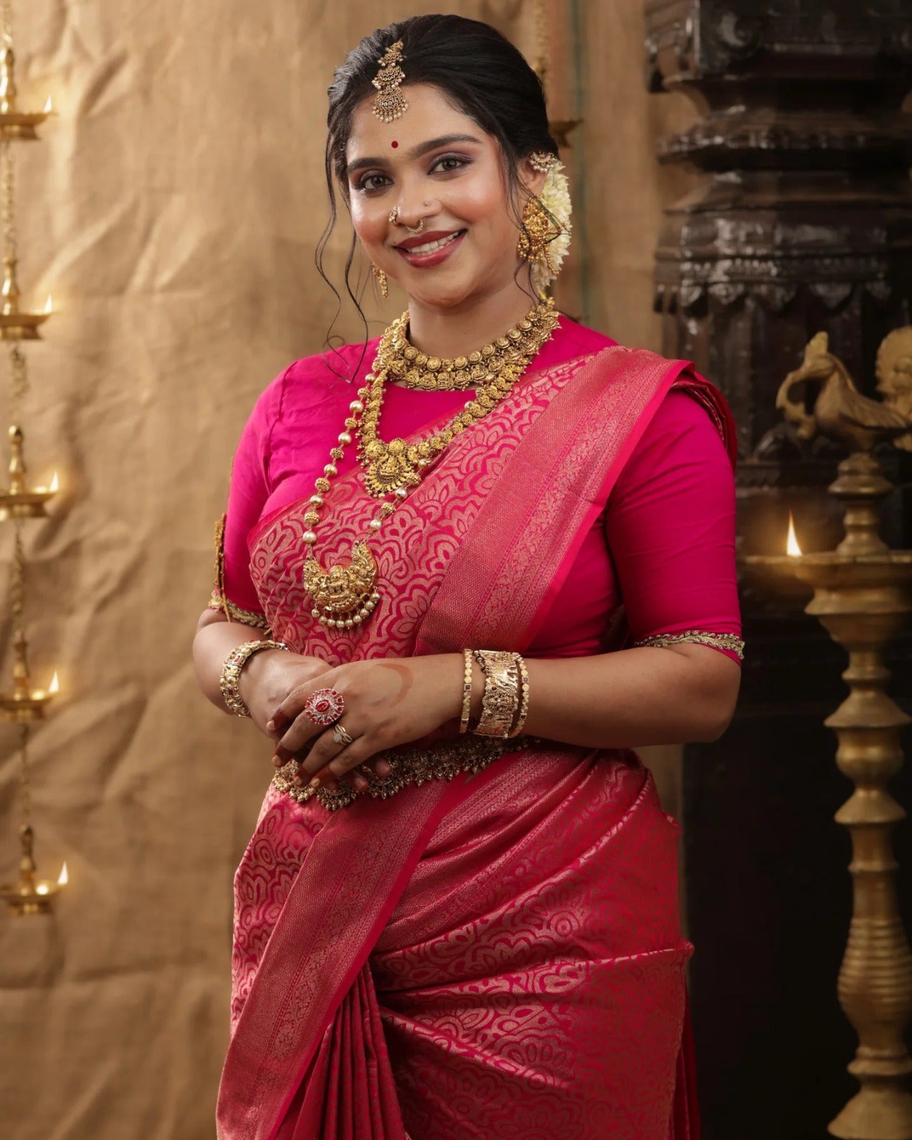 Silk Saree from the this store is adorned with beautiful Zari work in form of traditional motifs.