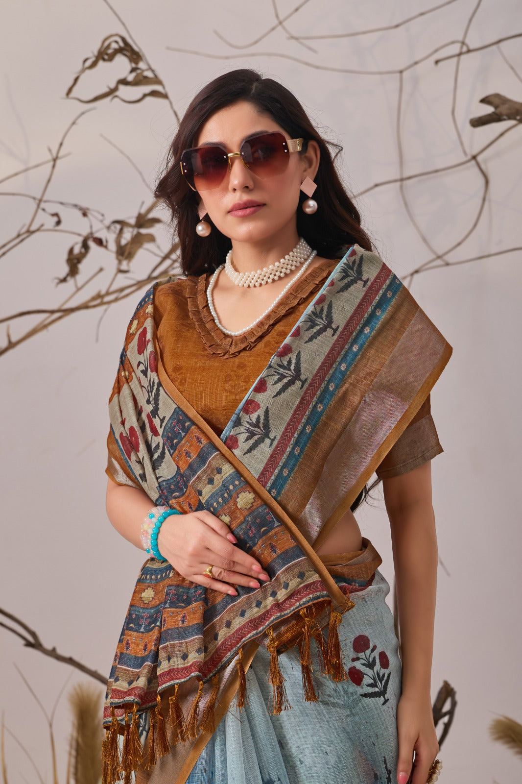 Contemporary Earthy-Toned Blue Traditional Printed Saree