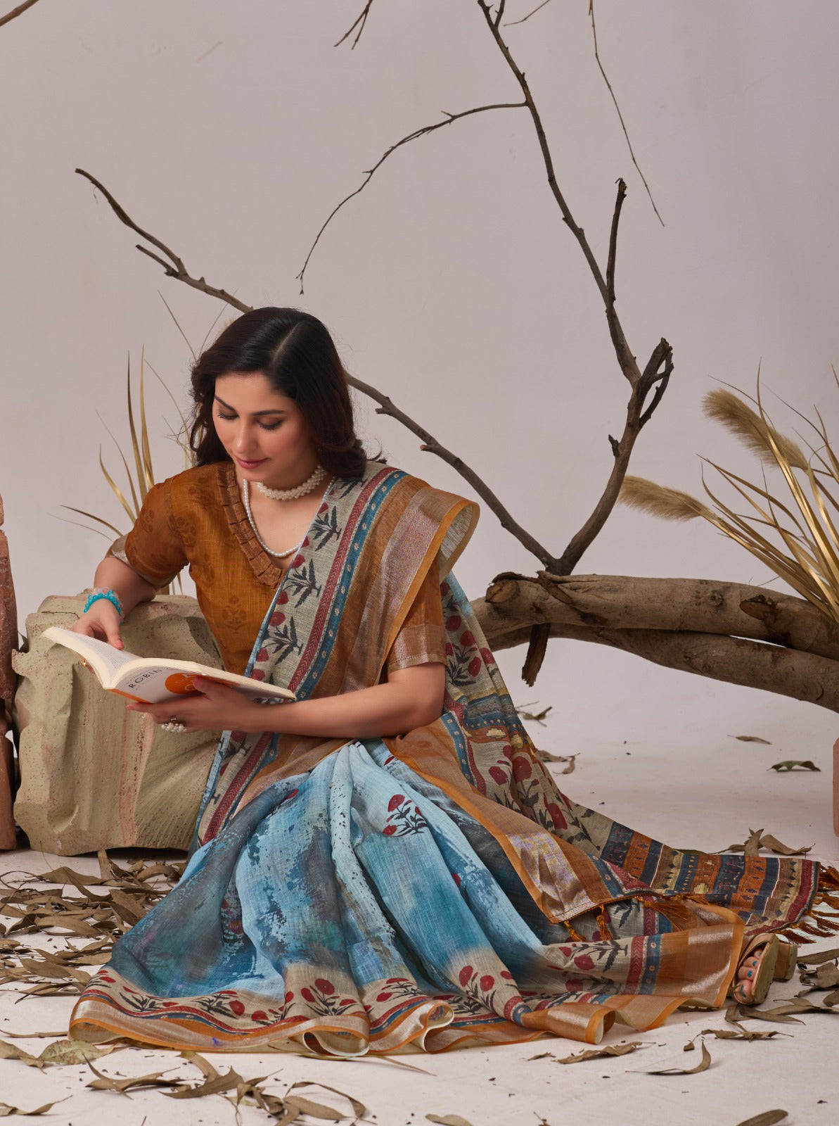 Contemporary Earthy-Toned Blue Traditional Printed Saree