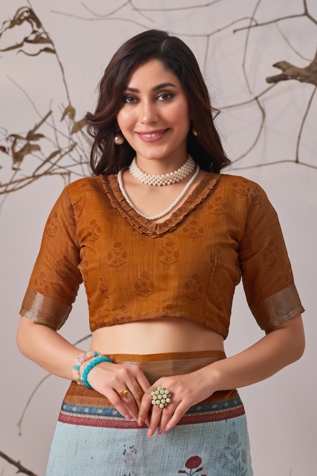 Contemporary Earthy-Toned Blue Traditional Printed Saree