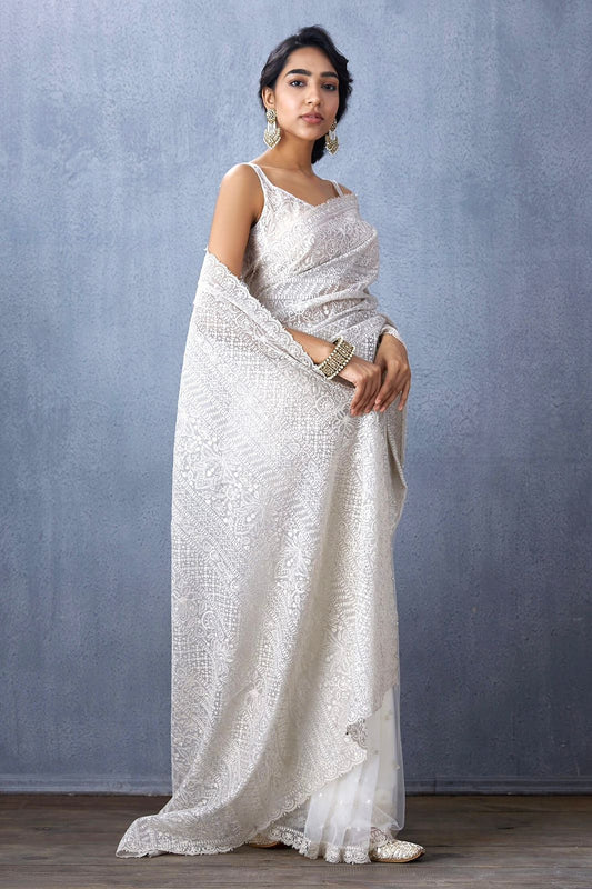 Pure White Lucknowi Chikankari Festive Saree featuring Intricate Floral Threadwork & Scalloped Borders