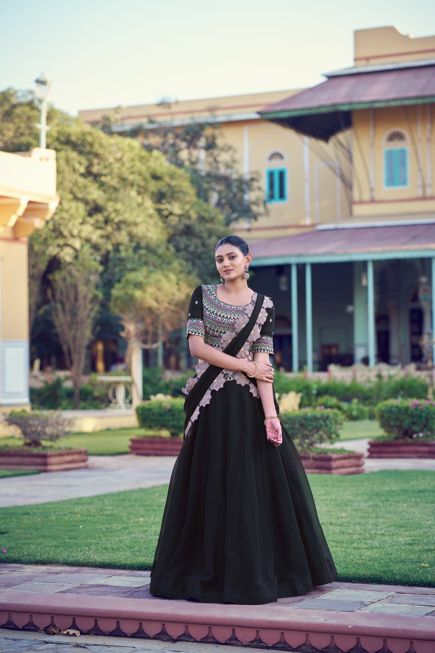 Aurum Georgette, enhanced with exquisite Thread & Sequins Embroidery.