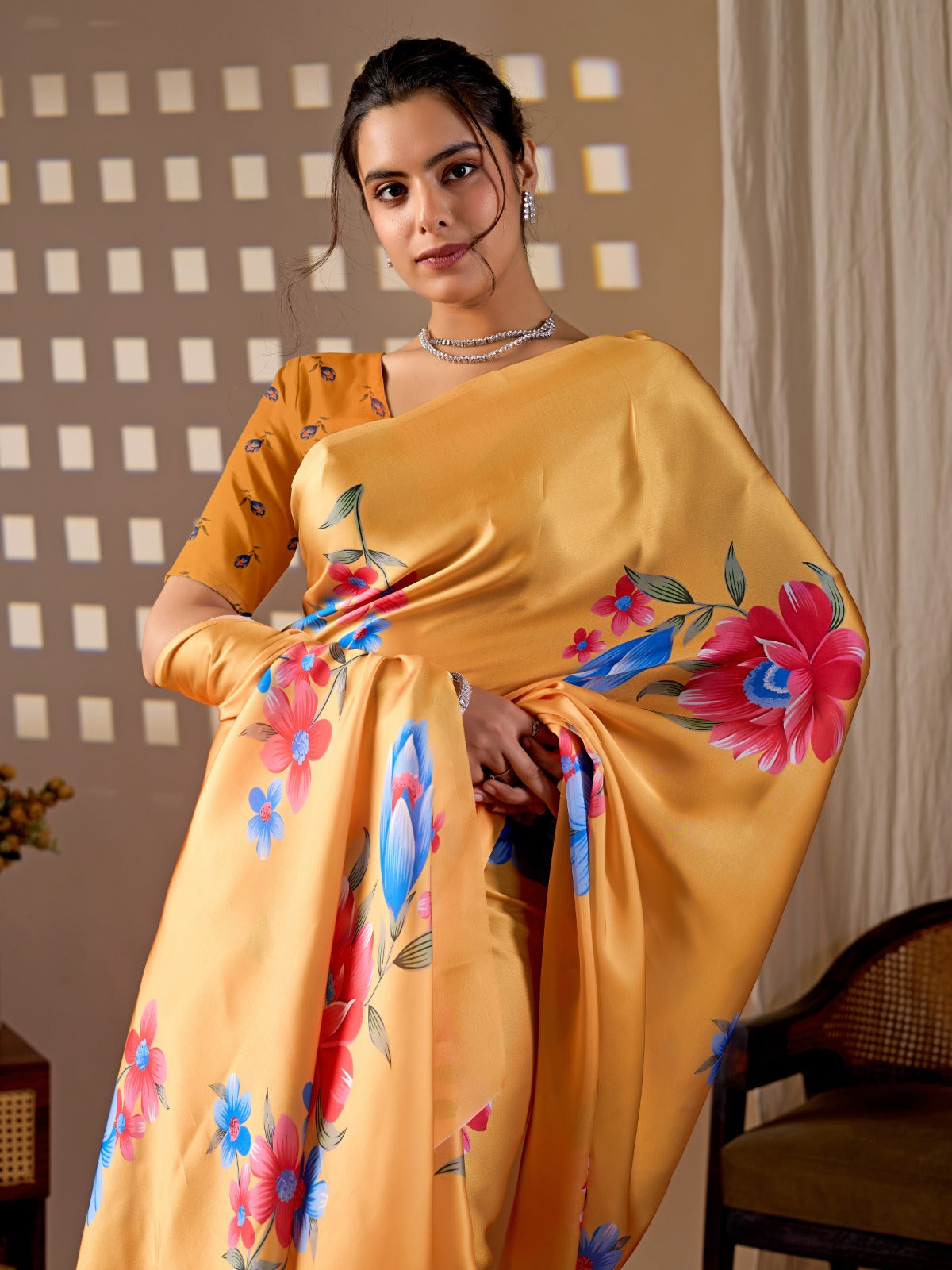 Elegant Golden Ochre Silk-Satin Saree Featuring Bold Contemporary Botanical Flower Motifs