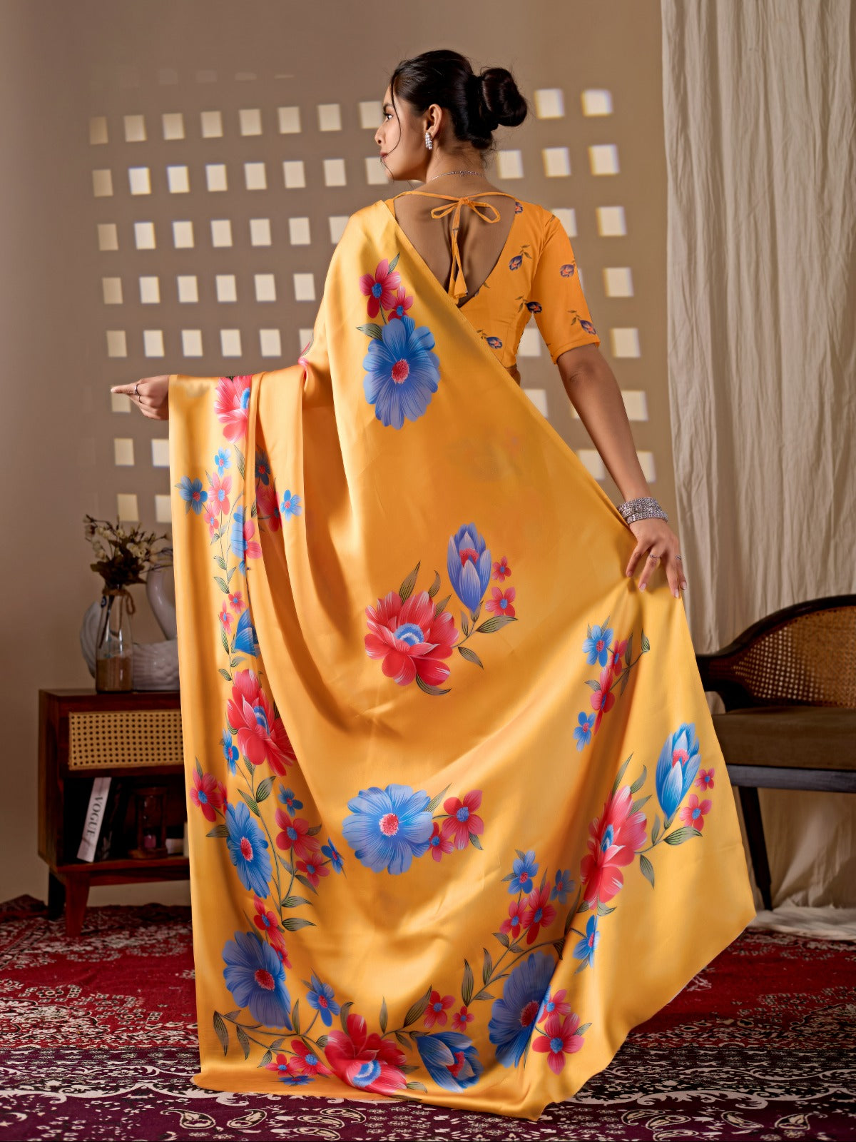 Elegant Golden Ochre Silk-Satin Saree Featuring Bold Contemporary Botanical Flower Motifs