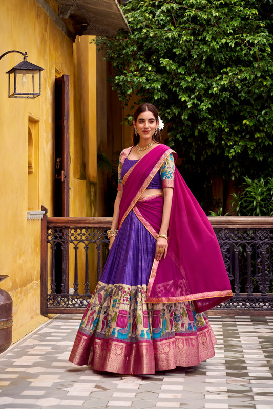 Step into timeless elegance with this Poly Chanderi lehenga, designed with delicate Zari stripes and enhanced with Kalamkari prints 🪷