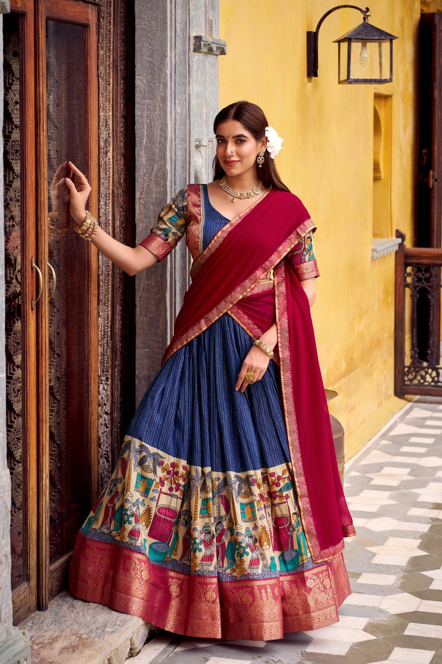 Step into timeless elegance with this Poly Chanderi lehenga, designed with delicate Zari stripes and enhanced with Kalamkari prints 🪷
