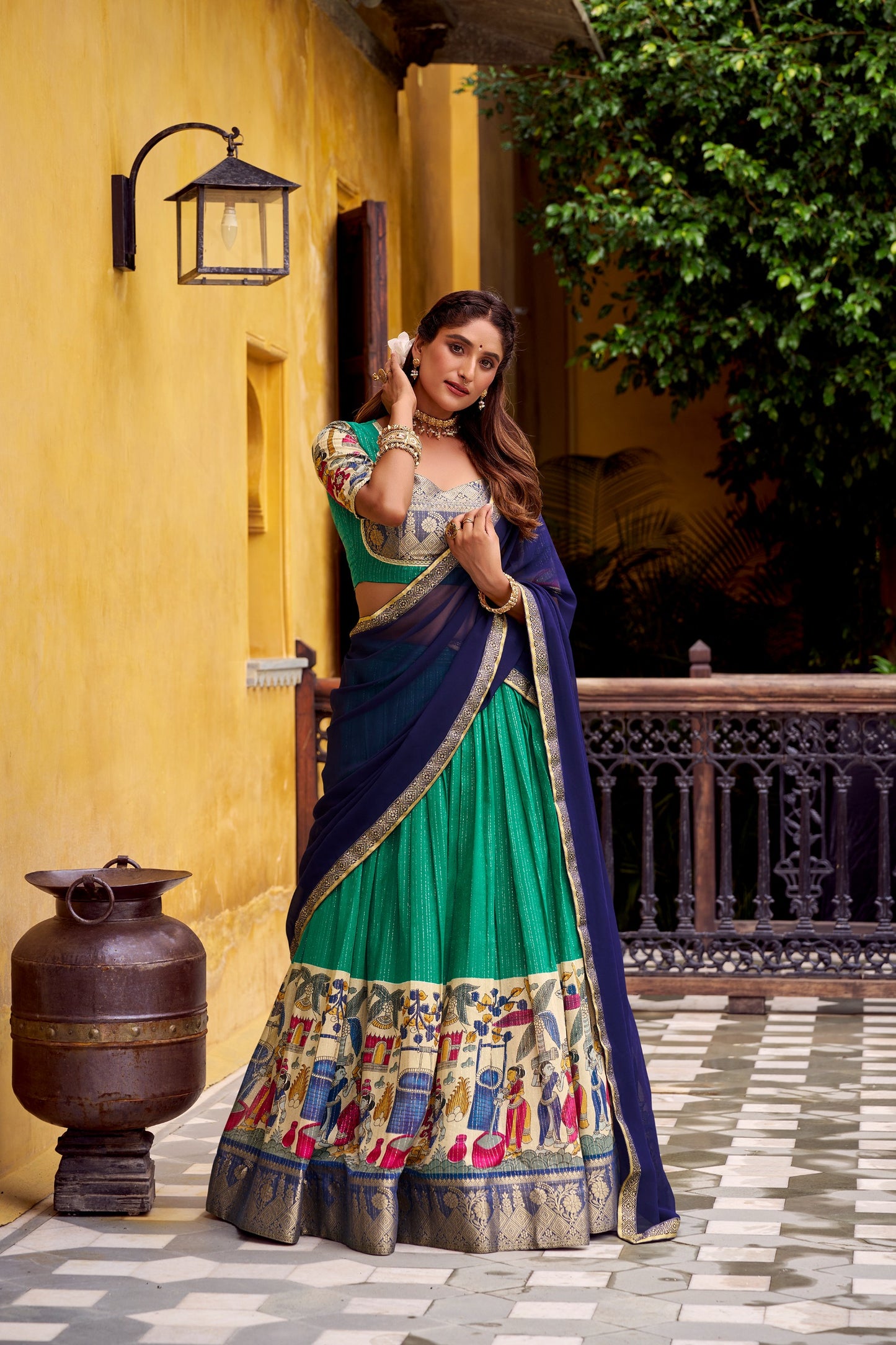 Step into timeless elegance with this Poly Chanderi lehenga, designed with delicate Zari stripes and enhanced with Kalamkari prints 🪷