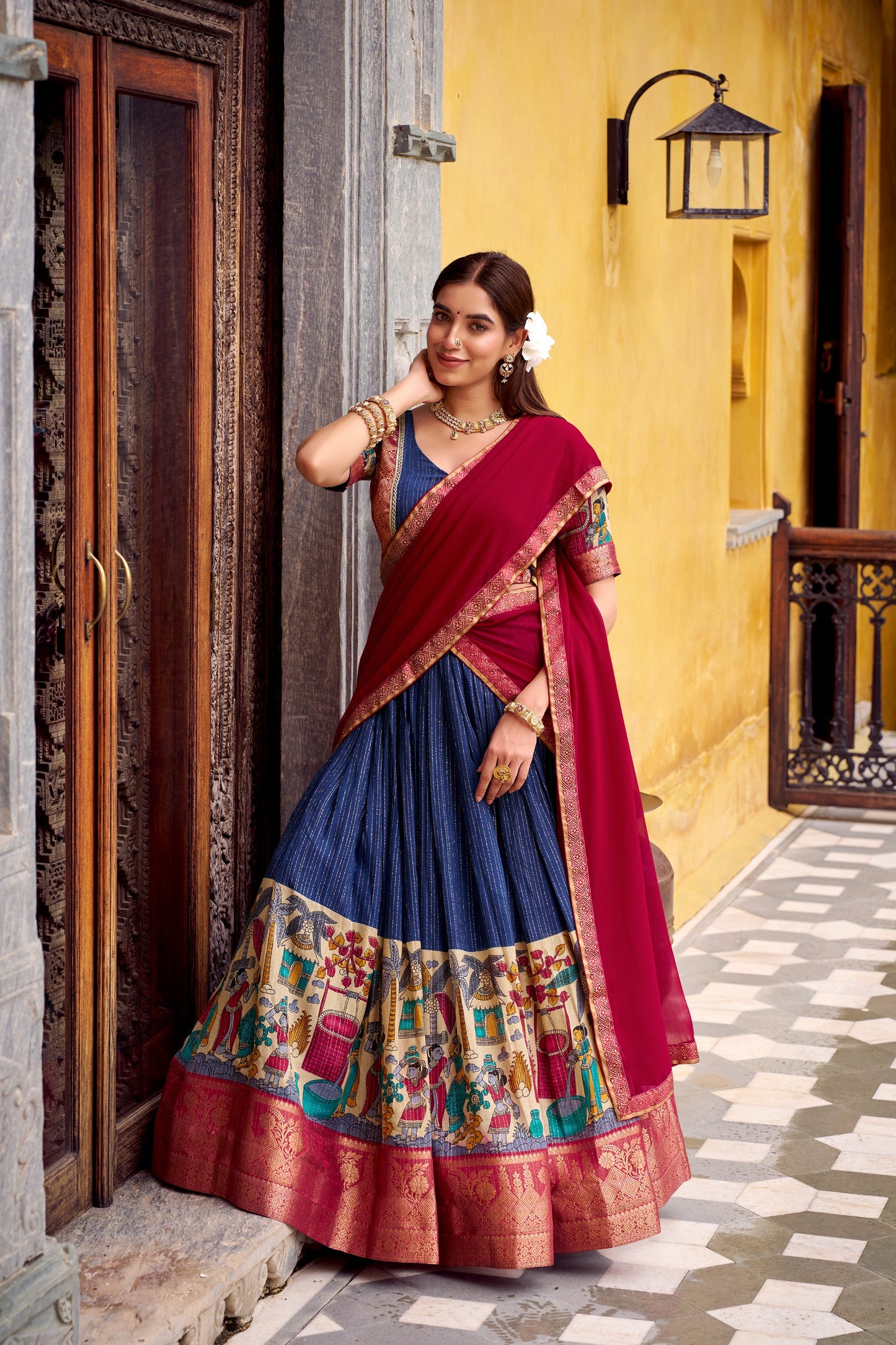 Step into timeless elegance with this Poly Chanderi lehenga, designed with delicate Zari stripes and enhanced with Kalamkari prints 🪷