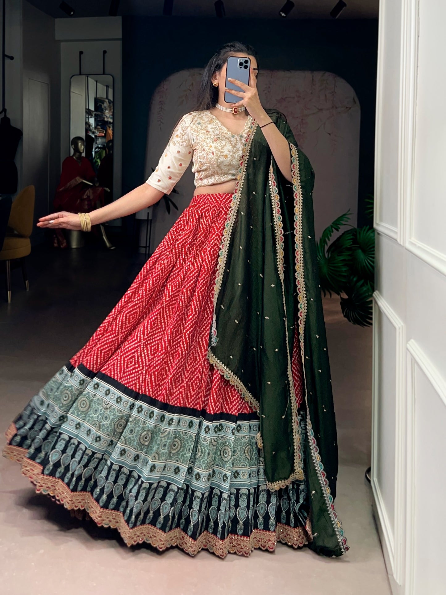 A beautiful blend of Bandhej and Ajrakh prints on soft rayon fabric, enhanced with delicate sequins, thread embroidery, and elegant lace detailing 🪞