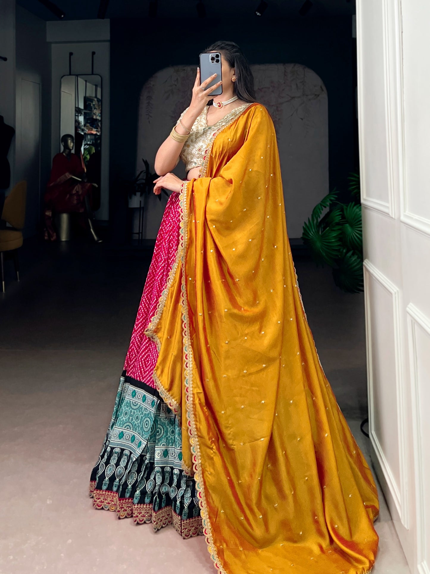 A beautiful blend of Bandhej and Ajrakh prints on soft rayon fabric, enhanced with delicate sequins, thread embroidery, and elegant lace detailing 🪞