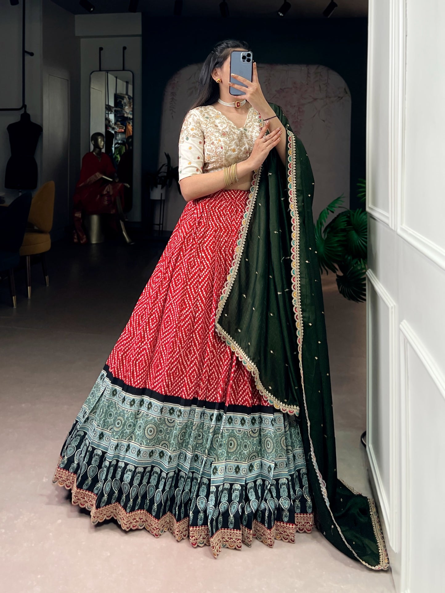 A beautiful blend of Bandhej and Ajrakh prints on soft rayon fabric, enhanced with delicate sequins, thread embroidery, and elegant lace detailing 🪞