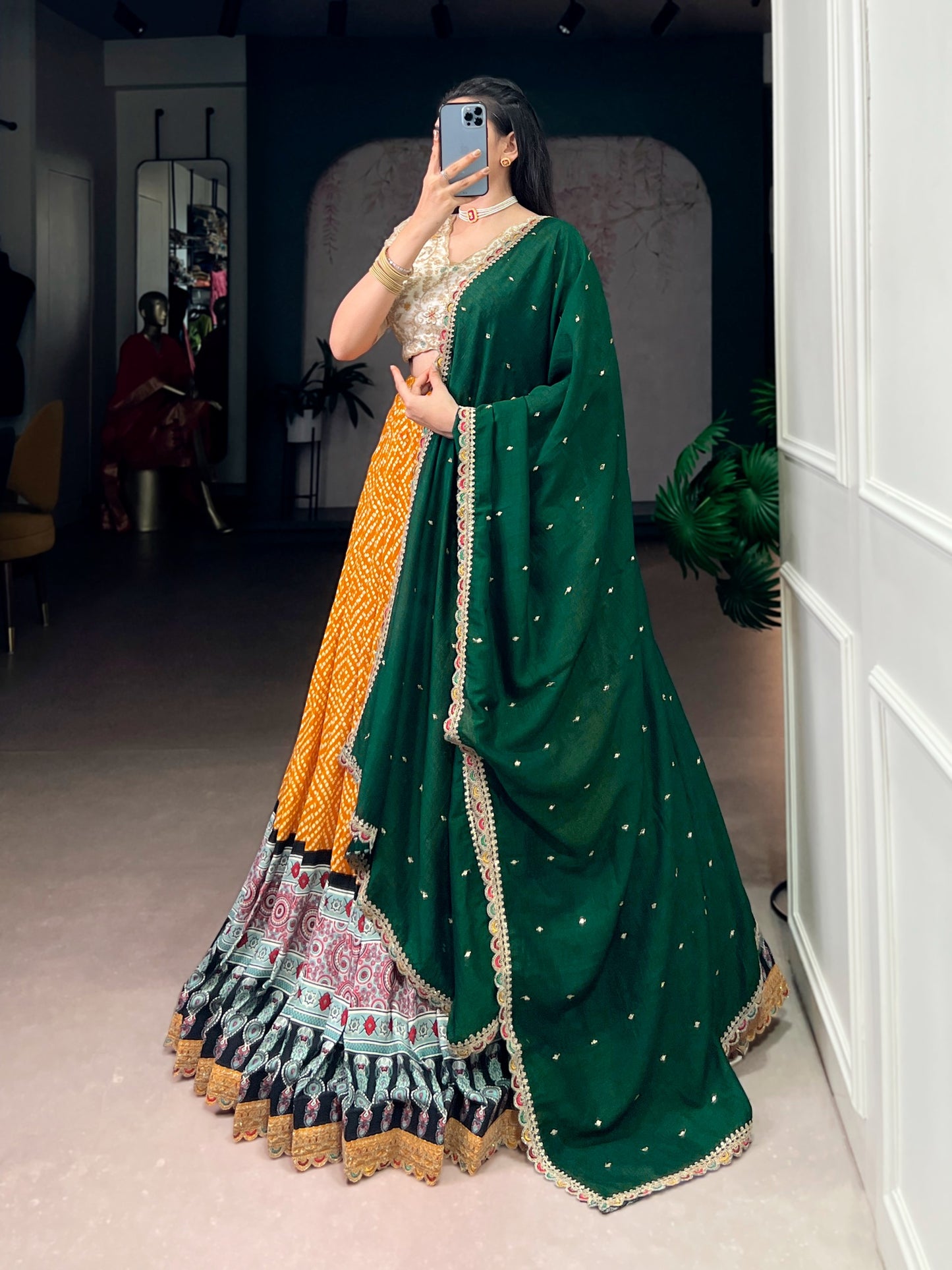 A beautiful blend of Bandhej and Ajrakh prints on soft rayon fabric, enhanced with delicate sequins, thread embroidery, and elegant lace detailing 🪞