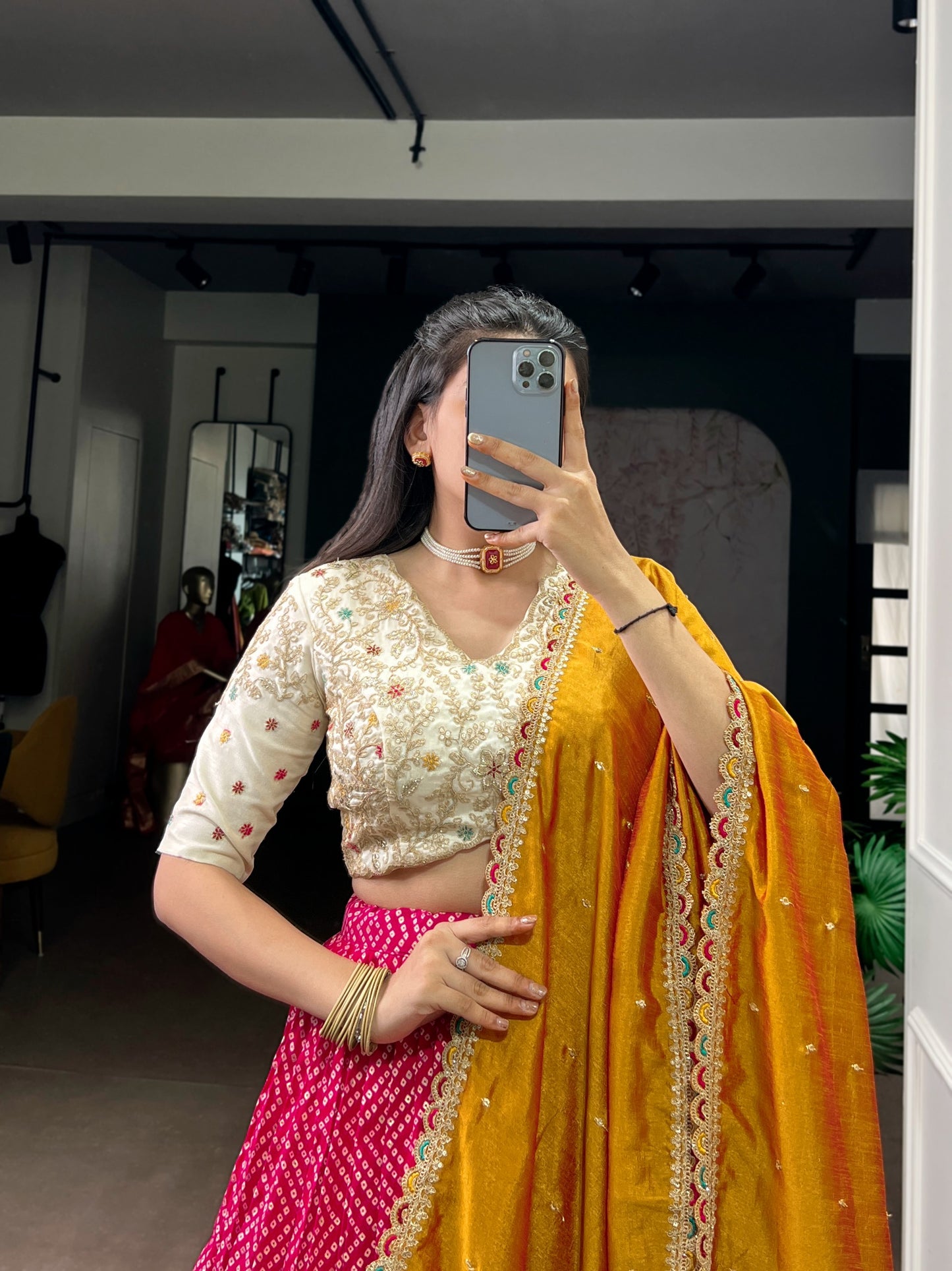 A beautiful blend of Bandhej and Ajrakh prints on soft rayon fabric, enhanced with delicate sequins, thread embroidery, and elegant lace detailing 🪞