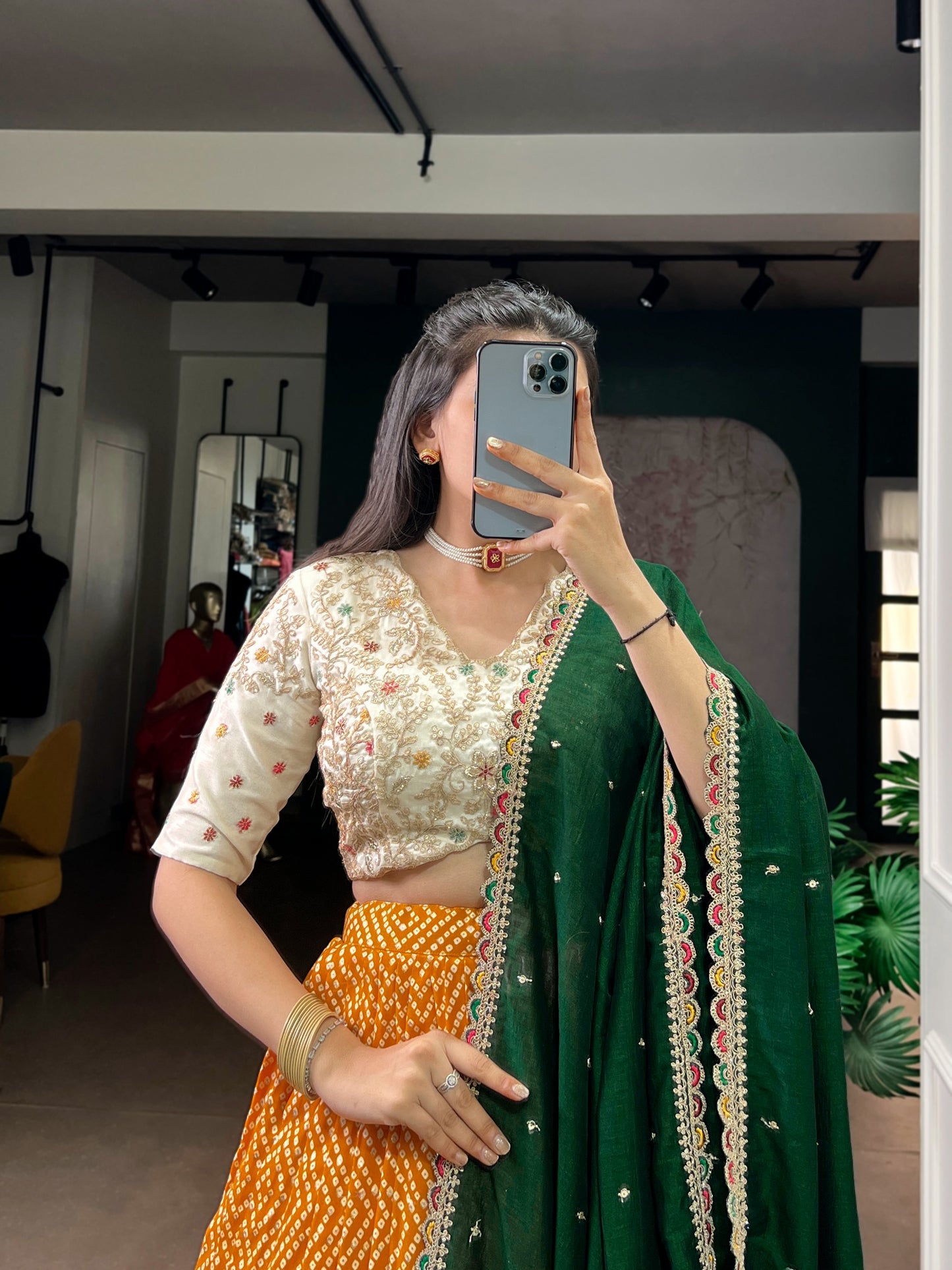 A beautiful blend of Bandhej and Ajrakh prints on soft rayon fabric, enhanced with delicate sequins, thread embroidery, and elegant lace detailing 🪞