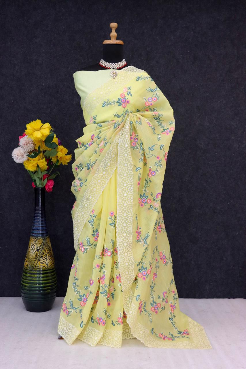 Pastel Organza Saree with Floral Embroidery and Chikankari-Style Lace Borders
